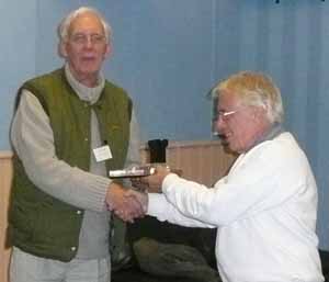 Geoff receives Gateway Trophy from Laurie