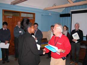 Laurie presenting 2012 students with course certificate