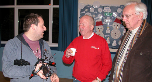 Franc with his helicopter talking to Pete and Geoff