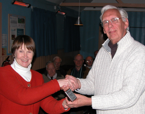 Anne presenting Geoff with Bournes mini shield