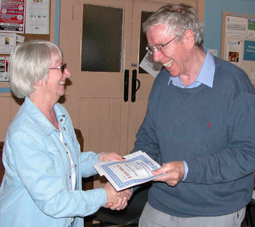 Linda presents Phil with 3 star BIAFF certificate