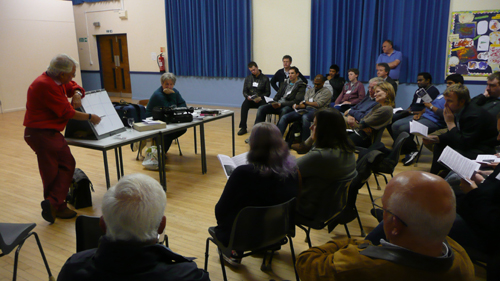 Laurie outlining the course to the audience in the big hall.