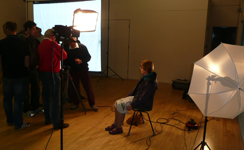 Various lighting equipment with Roger's 'green' screen (shown white) in background 