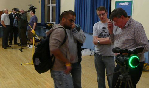 Roger discussing 'Green' screen chroma key facilities, Large camera jib in background