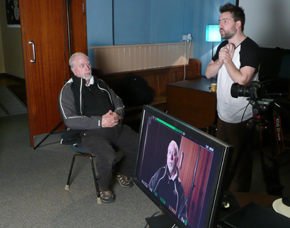 Neil with final lighting setup and monitor with camera image