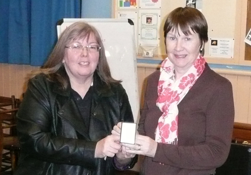 Karen presenting Anne with the Caversham mini shield