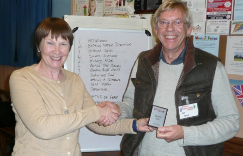 Jim revieves the Currie Cup mini shield from Anne