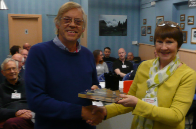 Jim accepts the Gateway trophy from Anne