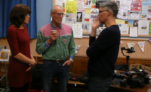 Celia and Tom talking to Alan from Meetup group