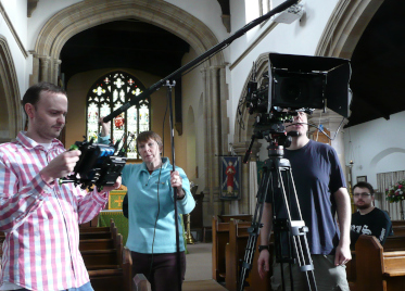 Director Andy studying the framing for a scene 