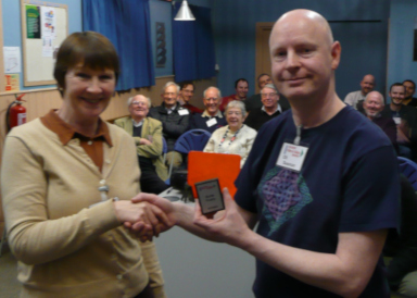 Anne presented Oli with the Burke mini shield