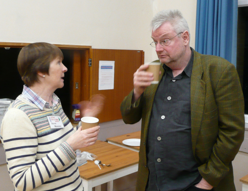 Anne talking to Carl in the tea break