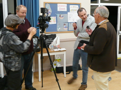 Sophie, Chas, Andy and Brian discussing camera details