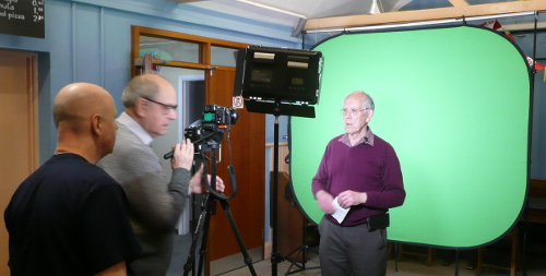 Oli with Charles filming Brian in small hall