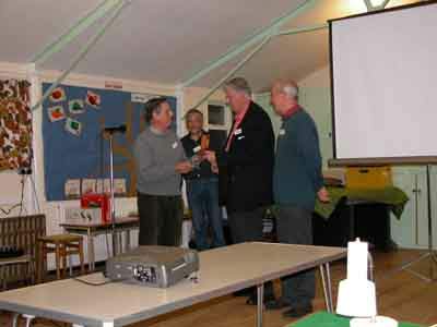 Haywards Heath club receiving the trophy from the judge