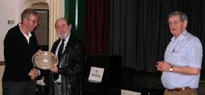 Phil receiving the trophy from the judge Jack Saltman