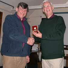 Geoff presenting the award to Roger